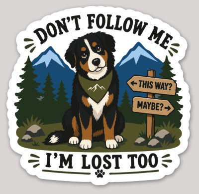 Happy adventure dog on a mountain trail with the words "Don't Follow Me, I'm Lost Too" on a vinyl sticker.