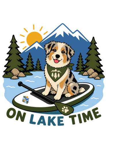 Happy Australian Shepherd paddle boarding on a mountain lake with the words "On Lake Time" on a vinyl sticker.